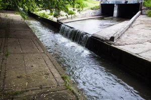 Water running out of sewers into lakes and rivers